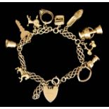 A 9ct Gold Link Charm Bracelet, hung with ten charms and with padlock clasp, gross weight 23g