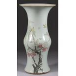 A Chinese Porcelain "Famille Rose" Vase, 19th Century, with flared base and neck, painted with