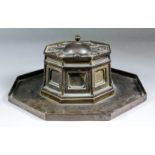 A Gilt and Bronzed Metal Octagonal Inkwell, 19th Century, of classical rotunda shape, 10.75ins