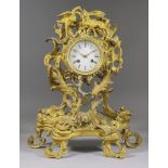 A Mid 19th Century French Gilt Brass Cased Mantel Clock of "Louis XV" Design, the 3.5ins diameter