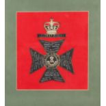 A King's Royal Rifle Corps Embroidered Cap Badge, in silver and coloured threads on a red ground,