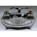 A Pewter Desk Presentation Inkwell, Late 19th Century, inscribed - "Presented to Serg.t Instr of
