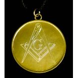 A 14ct Gold Masonic Medallion or Token, the face with square and compass, the reverse with working