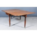 A Victorian Mahogany Drop Leaf Cottage Dining Table, with moulded edge to top, on turned legs and