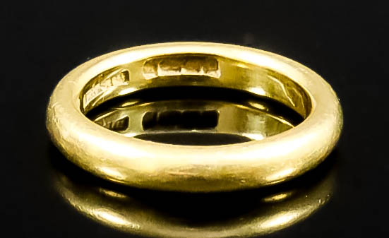 A 22ct Gold Wedding Band, Early 20th Century, size L, gross weight 7g
