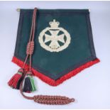 A Royal Green Jackets Music Stand Banner, with RGJ badge worked in silver thread on a green