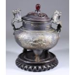 A Chinese Bronze Two-Handled Censer, Late 19th Century, the sides cast and engraved with a