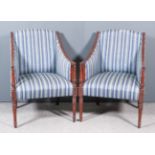A Pair of Mahogany Library Chairs of "Louis XVI" Design, with reeded curved arm supports,