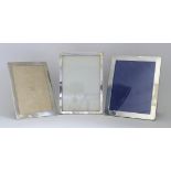 Two George V Plain Silver Rectangular Frames and an Elizabeth II Similar, one by Mappin & Webb,