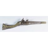 An Interesting .60 Calibre Child's Ottoman Flintlock Carbine, 10ins bright steel barrel, chased with