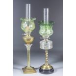 Two Brass Table Oil Lamps, one with plain reservoir, reeded column with Corinthian pattern top, on