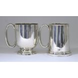 A Victorian Silver Tankard and a George V Silver Tankard, the Victorian tankard by Horace Woodward &