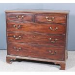 A George III Mahogany Chest, with moulded edge to top, fitted two short and three long graduated