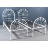 A Pair of Late Victorian 3ft White Painted Iron Bedsteads, with arched head and footboards, on