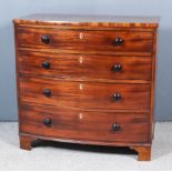 A Late Georgian Mahogany Bow Front Chest, with square edges, fitted four long graduated drawers with
