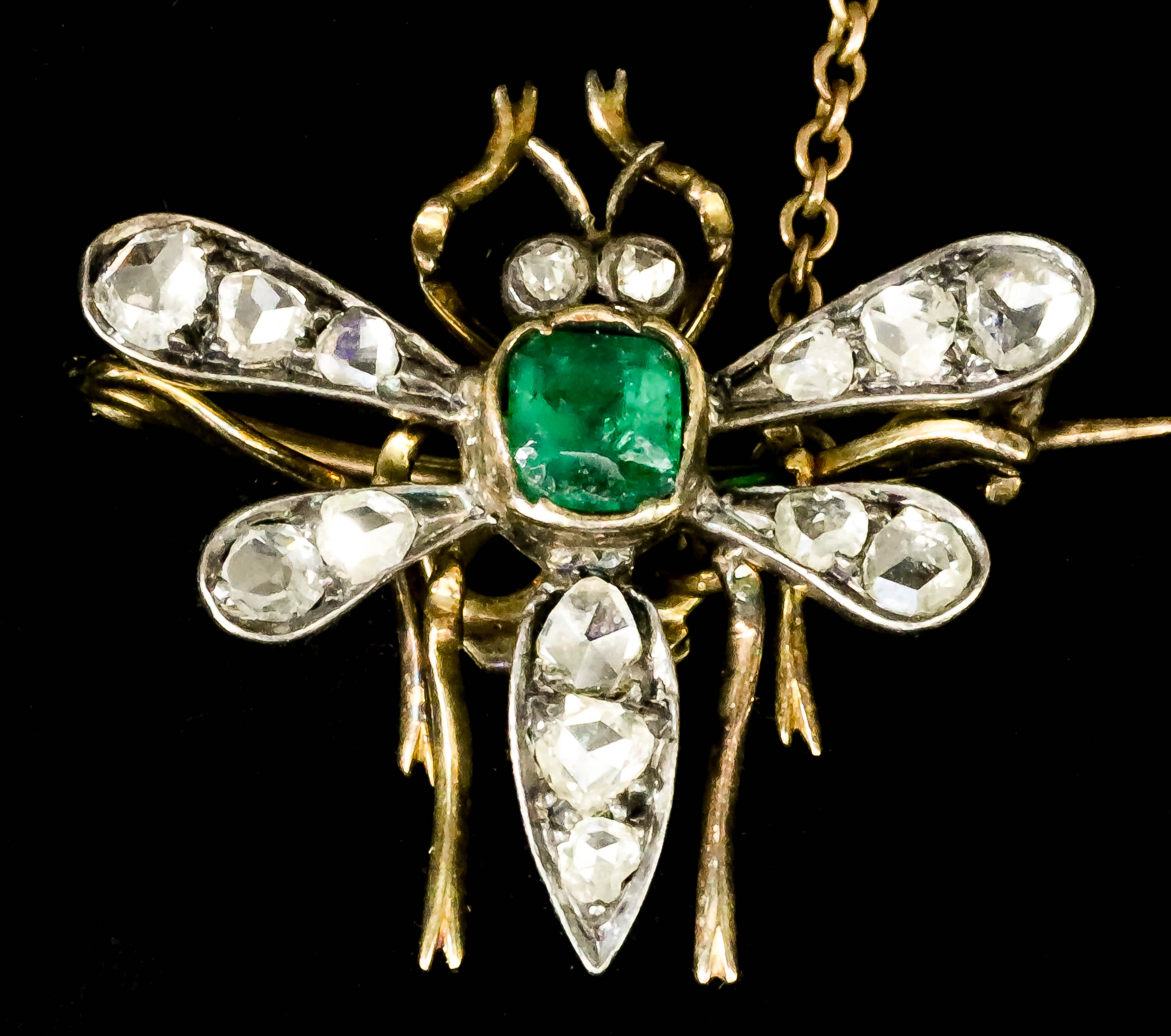 An Emerald and Diamond Butterfly Pattern Brooch, Late 19th Century, in gold coloured metal mount,