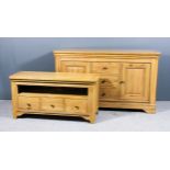 An Oak Sideboard, Modern, in the French manner, with flush panelled top and rounded front corners,