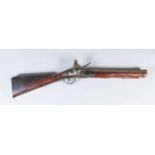 A Late 18th/Early 19th Century Flintlock Blunderbuss by Thomson, the plain 15.75ins brass barrel