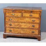 A Figured Walnut Chest of "18th Century" Design, the crossbanded top with moulded edge and central