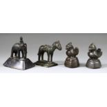 Four Small Near Eastern Bronze Animal Opium Weights, comprising - figure riding an elephant, 2.75ins
