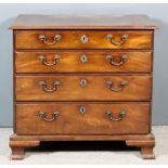 A George III Mahogany Chest, with moulded edge to top, fitted four long graduated drawers with later