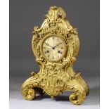 An Early 19th Century French Gilt Brass Cased Balloon Pattern Mantel Clock of "Louis XV" Design, No.