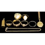 A Mixed Lot of 9ct Gold, comprising - an oval locket with engraved face, 20mm x 16mm, on fine