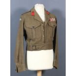 A Rifle Brigade Battle-Dress Blouse (1949 Pattern) - tailored by Montague Burton (1952), with