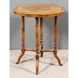 A Victorian Figured Walnut Octagonal Occasional Table, the top with matched quartered veneers inlaid