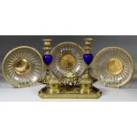 Three Early 20th Century Gilt Brass Circular Baskets, with glass liners, each 7.5ins diameter, an
