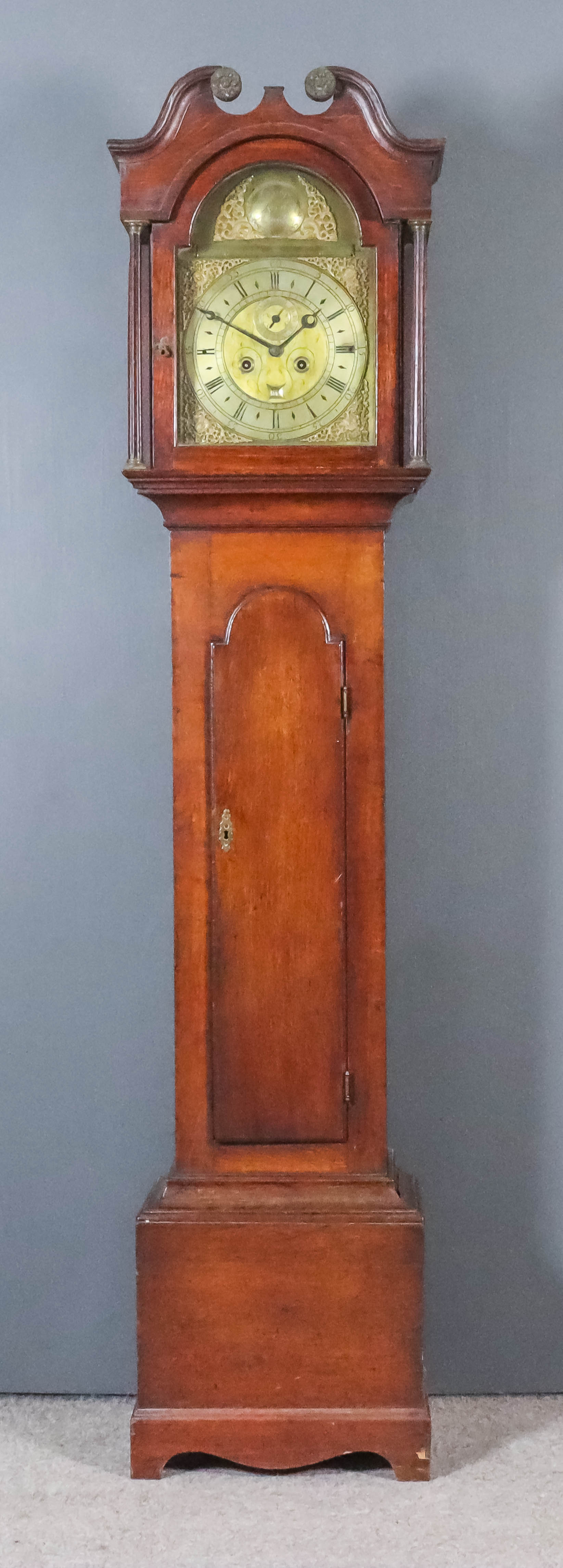 An 18th Century Oak Longcase Clock, the 12ins square brass dial with associated arch engraved "
