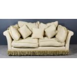 A Modern Three-Seat Settee, with scroll ends, upholstered in pale old gold striped chenille and