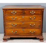 A George III Mahogany Chest, with moulded edge to top, fitted two short and three long drawers