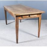 A 19th Century French Fruitwood Kitchen Table, with cleated top fitted frieze drawer to each end, on