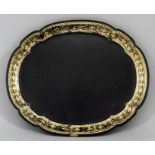 A Black Japanned Papier-Mâché Tray, 19th Century, of shaped outline, the rim painted in gilt with