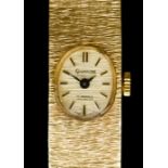 A Lady's Gigandet Wristwatch, 20th Century, 9ct Gold Cased, the oval gilt dial with gold baton