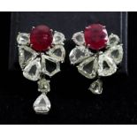 A Pair of Ruby and Diamond Earrings, Modern, in white coloured metal mount, for pierced ears and