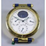 A Modern Cartier Lacquered Brass Desk Clock, No. 00395, the cream dial with raised hour button and
