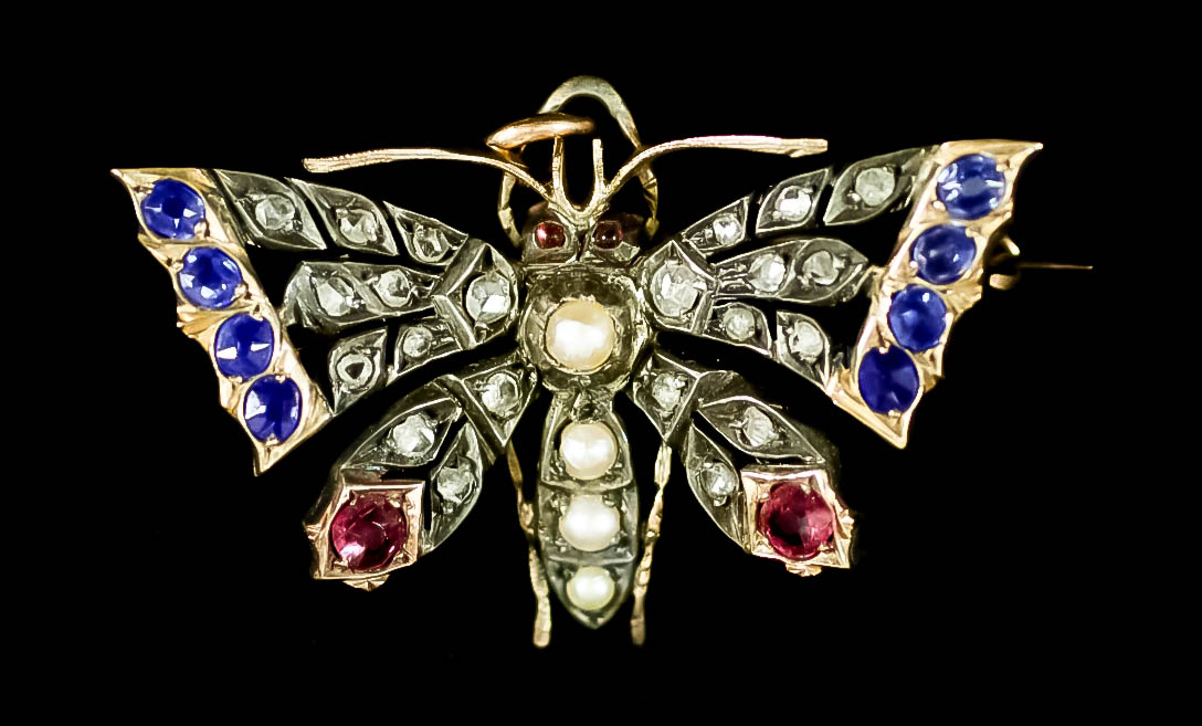 A Gold Coloured Metal Butterfly Pattern Brooch, Late Victorian, set with rose diamonds, eight