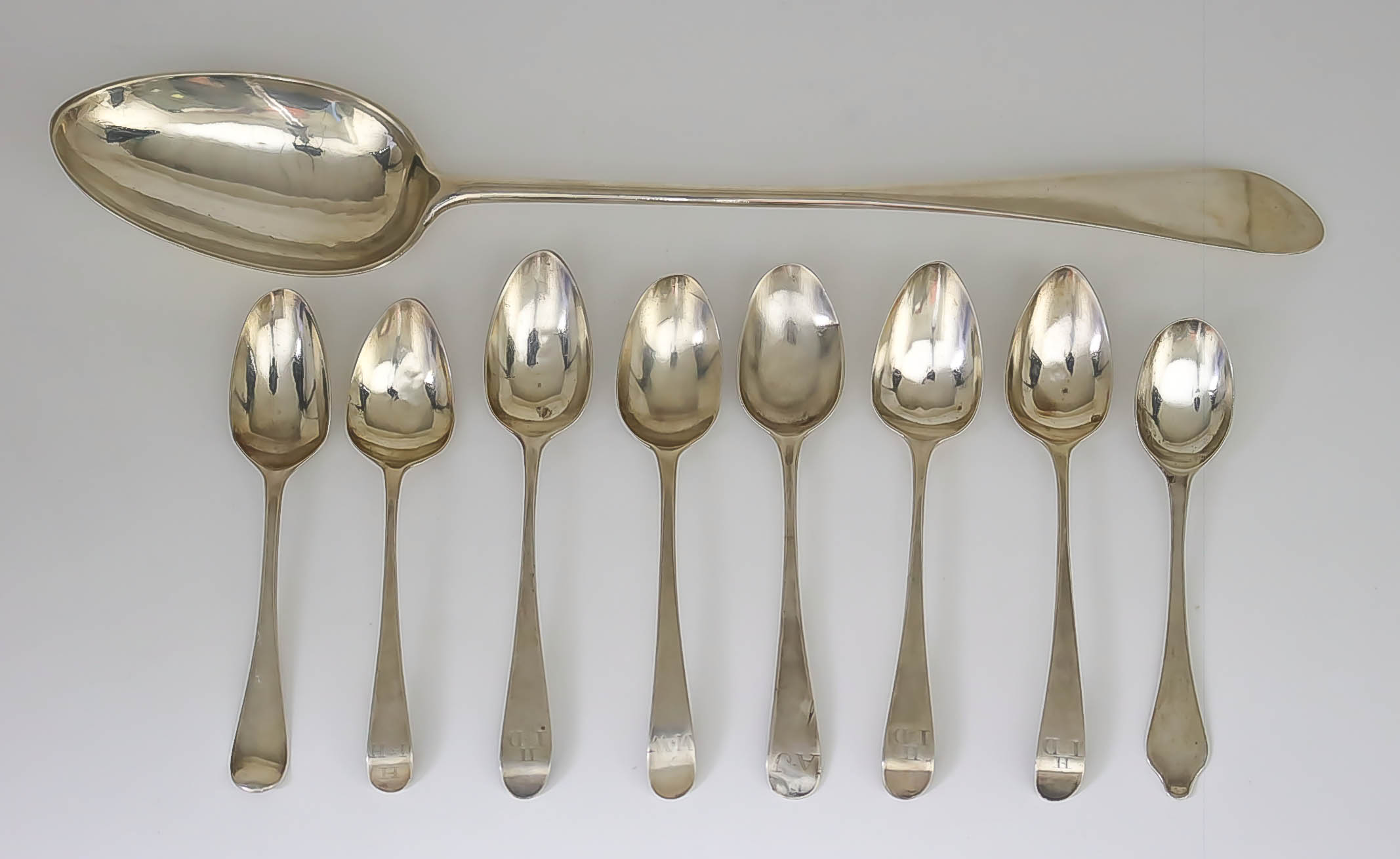 A George III "Scottish" Silver Gravy Spoon, and Mixed Silver Spoons, the gravy spoon makers mark