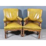 A Pair of Late Victorian Oak Square Back Armchairs, the seat, back and arm pads upholstered in old