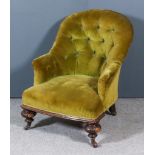 A Victorian Spoonback Easy Chair, upholstered in old gold cloth, the back buttoned, on turned