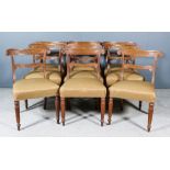 A Set of Nine George IV Oak Dining Chairs, each with narrow curved crest rail carved with two