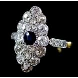 A Sapphire and Diamond Ring, Early 20th Century, in 18ct gold mount, the oval face set with