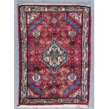 Two Hamaden Rugs, Late 20th Century, woven in colours, the central geometric medallion with