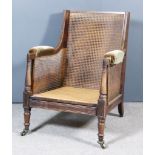 A Late George III Mahogany Framed Square Wingback Bergere Armchair, with triple reeded frame work