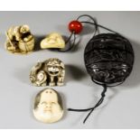 A Collection of Japanese Netsuke and Sagemono, Meiji Period, comprising - a three section case