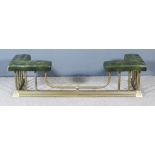 A Brass Rectangular Club Fender, with green leather upholstered top, 54.5ins wide x 17ins deep x