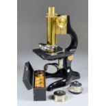 A Brass and Cast Iron Microscope, Circa 1920, by Ernst Leitz, No. 191411, with spare lenses, eye