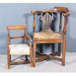 An 18th Century Elm Corner Chair, with horseshoe pattern back and twin fretted vase pattern